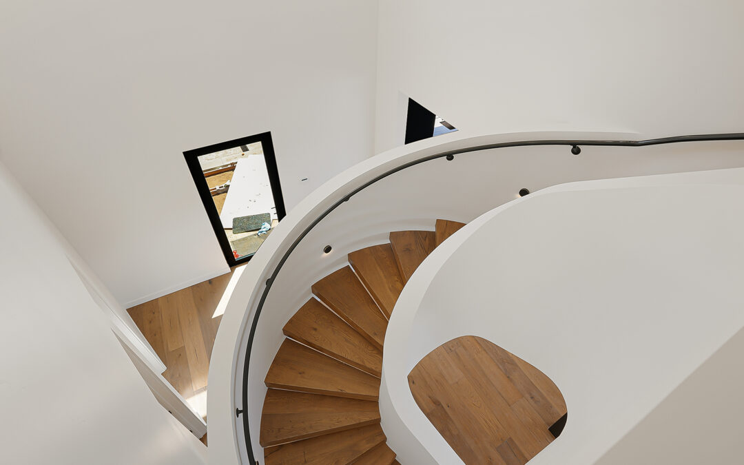 Curved Floating Stairway in Existing Residence
