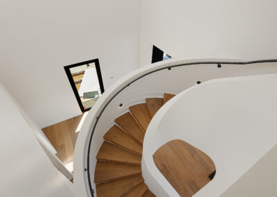 Curved Floating Stairway in Existing Residence
